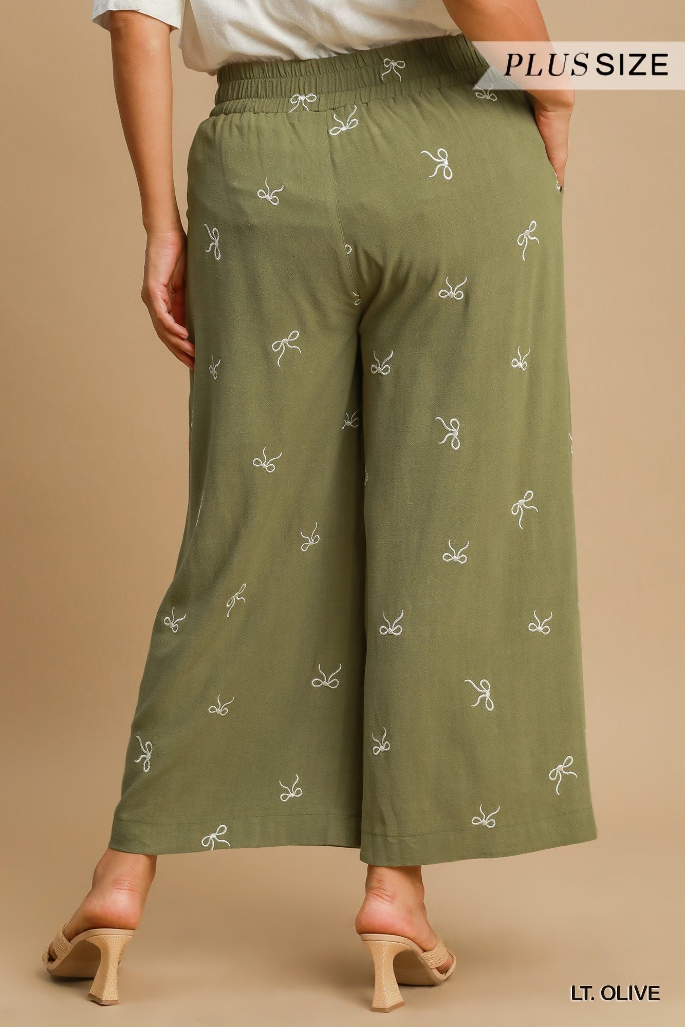 Pantalon en lin avec motifs de boucles (olive)