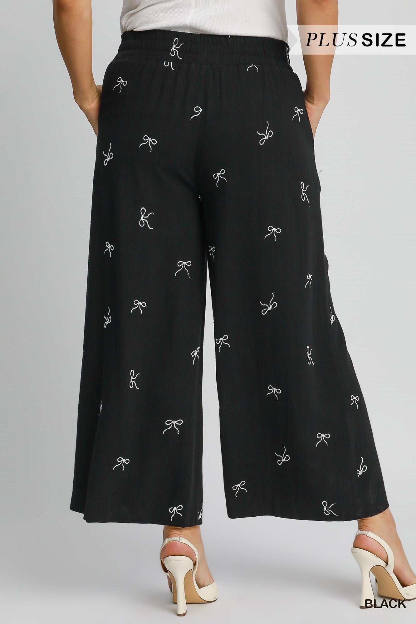 Pantalon en lin avec motifs de boucles (noir)